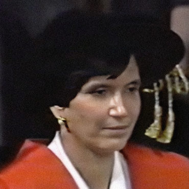 Edwina standing, wearing a red and white dress. She looks calm and relaxed. The image features the Centennial 100 logo and the title 